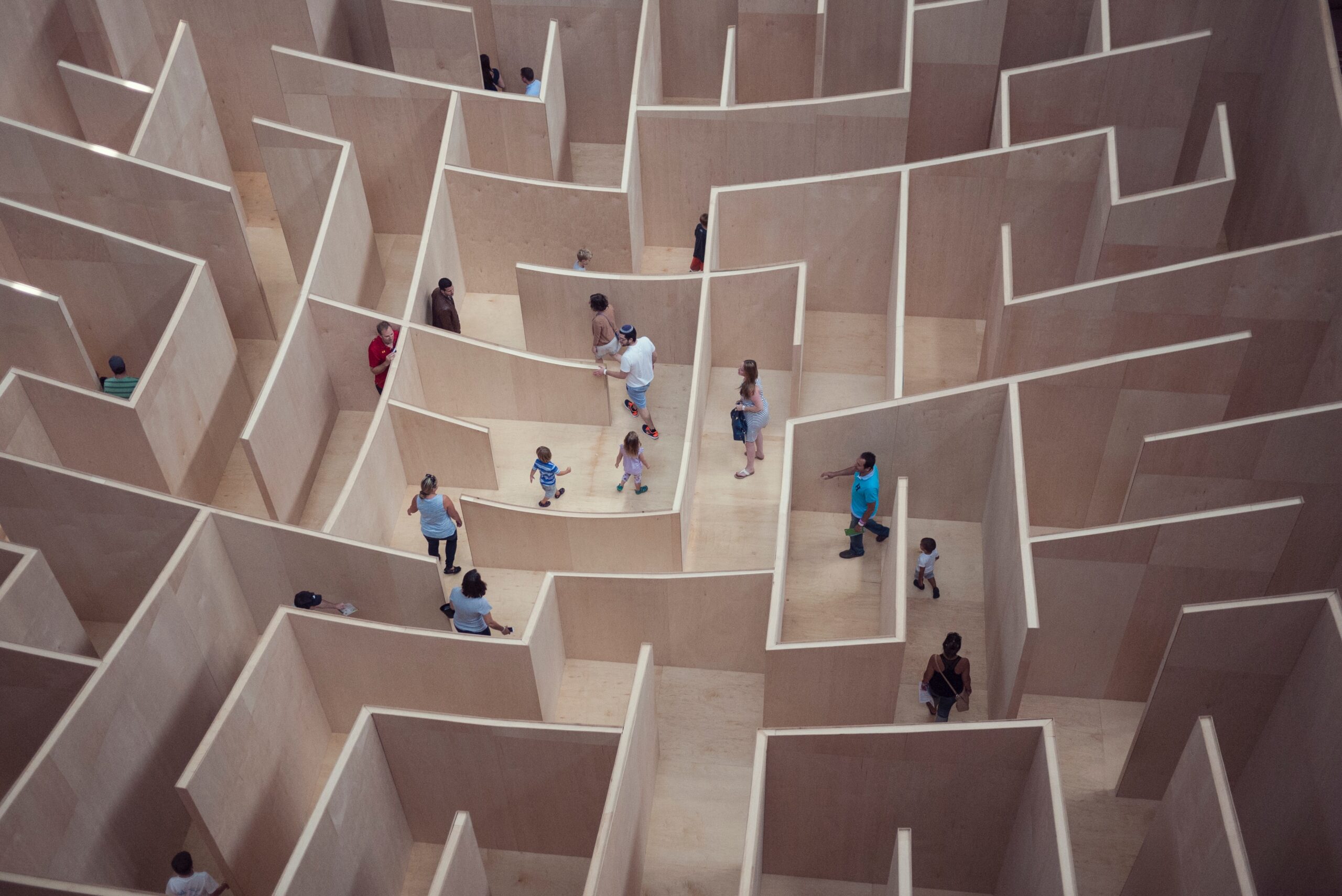A people walking through a maze.