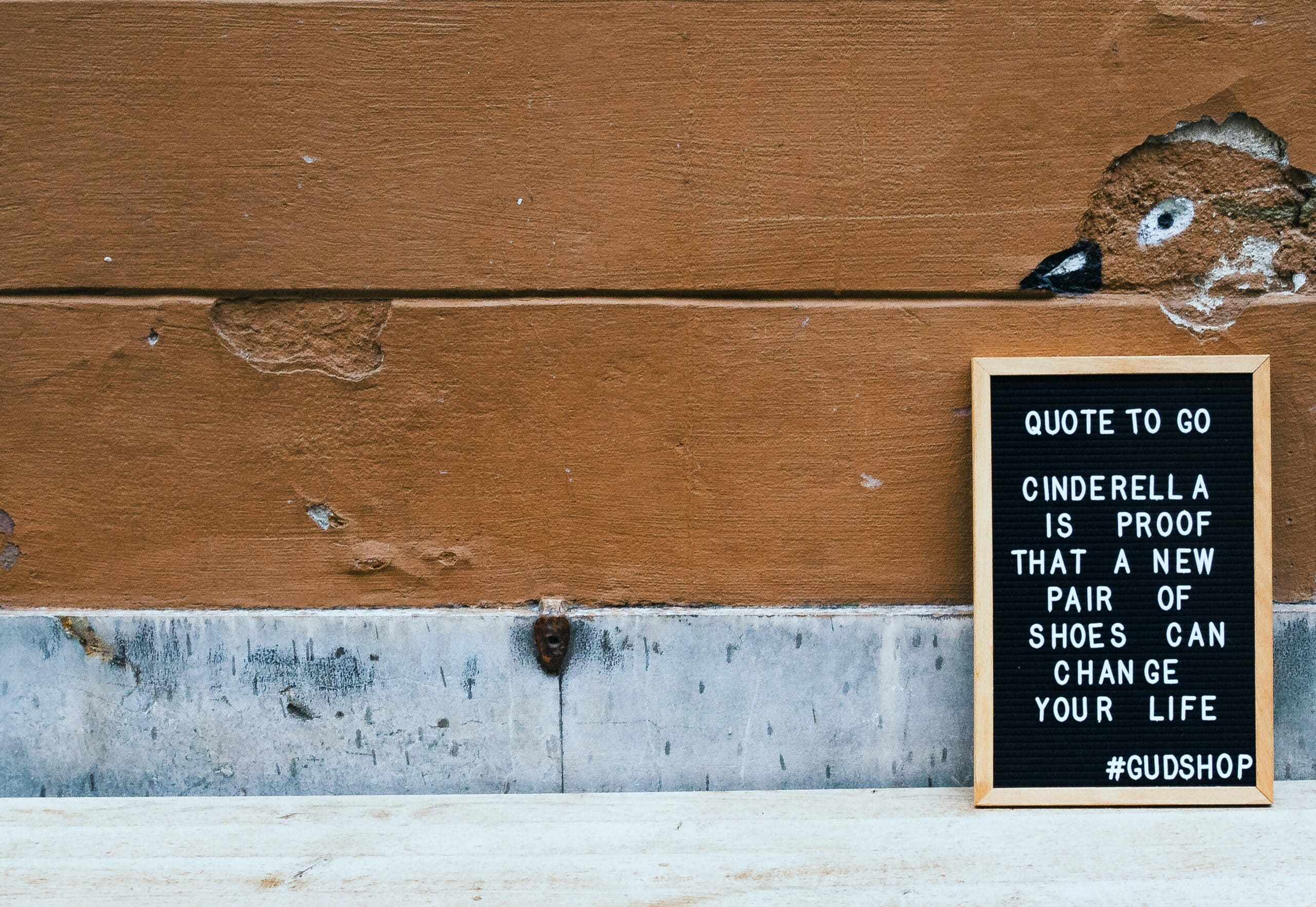 Photo of a letterboard with a quote: Cinderella is proof that a new pair of shoes can change your life.